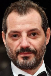 Адель Карам