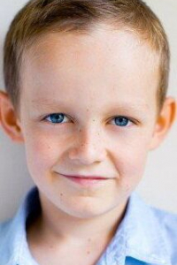 Том Поултон