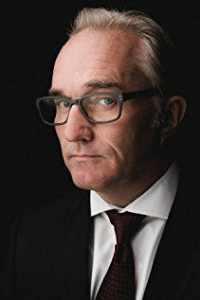 Рон Е. Рэйнс