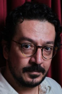 Толга Карачелик