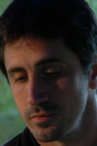 Крис Солимайн